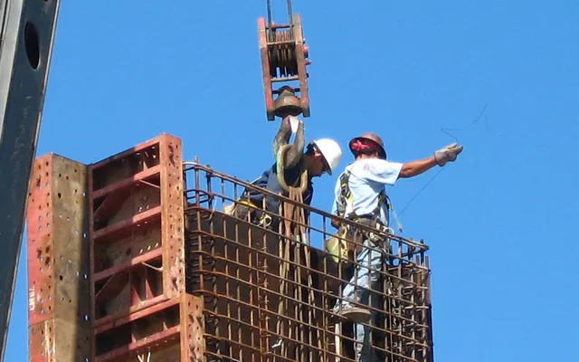 Construction worker at formwork and reinforcement